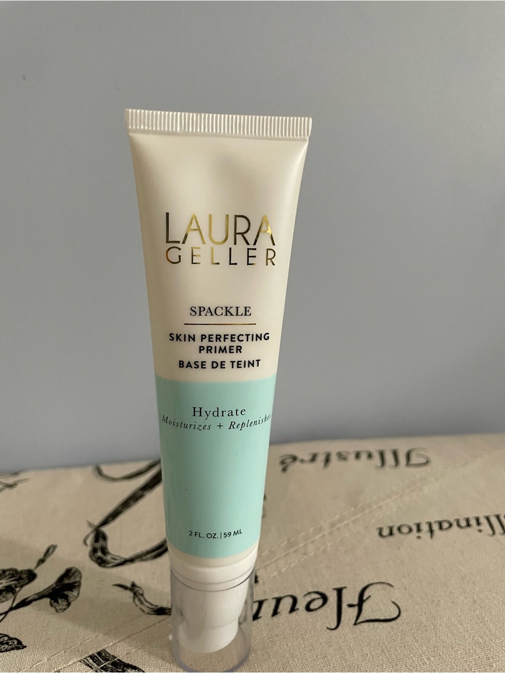 Laura Geller Hydrate Spackle Primer in Mint and Cream